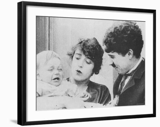 Charlie Chaplin with Mabel Normand in "His Trysting Place."-null-Framed Premium Photographic Print