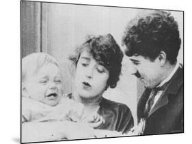 Charlie Chaplin with Mabel Normand in "His Trysting Place."-null-Mounted Premium Photographic Print