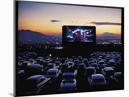 Charlton Heston as Moses in Motion Picture "The Ten Commandments" Shown at Drive in Movie Theater-J. R. Eyerman-Mounted Photographic Print