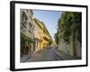 Charming residential street in historic Cartagena, Colombia.-Jerry Ginsberg-Framed Photographic Print