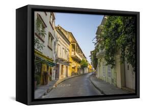 Charming residential street in historic Cartagena, Colombia.-Jerry Ginsberg-Framed Stretched Canvas