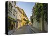 Charming residential street in historic Cartagena, Colombia.-Jerry Ginsberg-Stretched Canvas