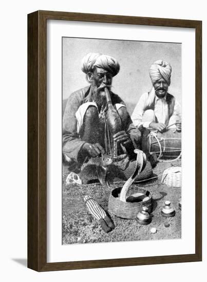 Charming the Venom from a Cobra; a Snake Charmer with a Mongoose, India, 1922-JH Reverend Powell-Framed Giclee Print