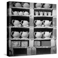 Cheap Chinaware Saucers, Cups, Teapots, Etc Standing on Racks in Pottery of the Hall China Co-Walker Evans-Stretched Canvas