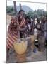 Cheerful Young Girls Pound Corn Outside Families' Homes Near Monkey Bay, South End of Lake Malawi-Nigel Pavitt-Mounted Photographic Print