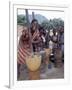 Cheerful Young Girls Pound Corn Outside Families' Homes Near Monkey Bay, South End of Lake Malawi-Nigel Pavitt-Framed Photographic Print