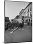 Cheerleaders Parading Prior to a Football Game Between Queens College and the University of Toronto-Lisa Larsen-Mounted Photographic Print