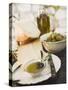 Cheese, Olives and Olive Oil on Table Out of Doors-null-Stretched Canvas