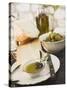 Cheese, Olives and Olive Oil on Table Out of Doors-null-Stretched Canvas