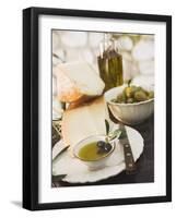 Cheese, Olives and Olive Oil on Table Out of Doors-null-Framed Photographic Print