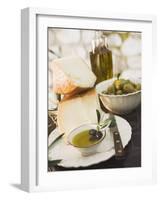 Cheese, Olives and Olive Oil on Table Out of Doors-null-Framed Photographic Print