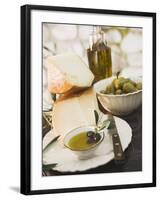 Cheese, Olives and Olive Oil on Table Out of Doors-null-Framed Photographic Print