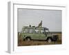 Cheetah on Safari Vehicle, Masai Mara National Reserve, Kenya, East Africa-James Hager-Framed Photographic Print