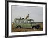 Cheetah on Safari Vehicle, Masai Mara National Reserve, Kenya, East Africa-James Hager-Framed Photographic Print