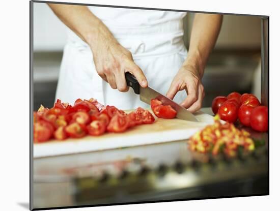 Chef Chopping Tomatoes-Robert Kneschke-Mounted Photographic Print