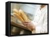 Chef Hurrying Through Kitchen with Baguettes-null-Framed Stretched Canvas