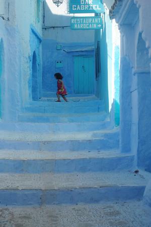 https://imgc.allpostersimages.com/img/posters/chefchaouen-girl_u-L-Q10W5NT0.jpg?artPerspective=n