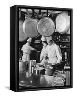 Chefs Cooking in a Restaurant Kitchen at Radio City-Bernard Hoffman-Framed Stretched Canvas