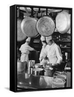 Chefs Cooking in a Restaurant Kitchen at Radio City-Bernard Hoffman-Framed Stretched Canvas