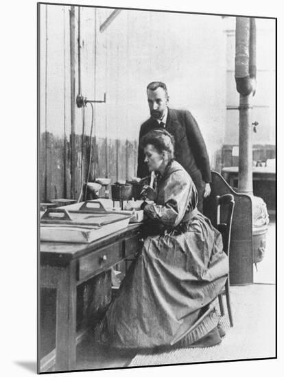 Chemists Pierre Curie and Wife Marie Curie in Their Laboratory-null-Mounted Premium Photographic Print