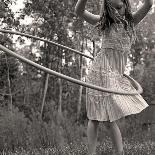 Young Girl Twirling Hula Hoop Outdoors In Sepia For Vintage Look-CherylCasey-Framed Stretched Canvas