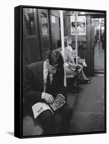 Chess Champion Bobby Fischer Working on His Moves During a Subway Ride-Carl Mydans-Framed Stretched Canvas