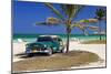 Chevrolet Classic Car under a Palm Tree on the Beach of the Island of Cayo Coco, Cuba-null-Mounted Art Print