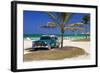 Chevrolet Classic Car under a Palm Tree on the Beach of the Island of Cayo Coco, Cuba-null-Framed Art Print