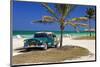 Chevrolet Classic Car under a Palm Tree on the Beach of the Island of Cayo Coco, Cuba-null-Mounted Art Print