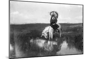 Cheyenne Indian, Wearing Headdress, On Horseback Photograph-null-Mounted Poster