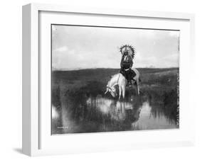 Cheyenne Indian, Wearing Headdress, on Horseback Photograph-Lantern Press-Framed Art Print