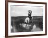 Cheyenne Indian, Wearing Headdress, on Horseback Photograph-Lantern Press-Framed Art Print
