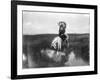 Cheyenne Indian, Wearing Headdress, on Horseback Photograph-Lantern Press-Framed Art Print