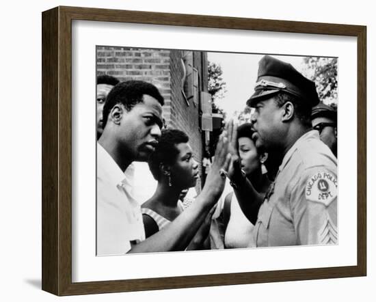 Chicago African American Policeman Tries to Calm a Crowd-null-Framed Photo