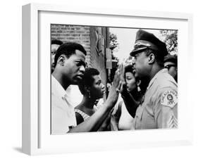 Chicago African American Policeman Tries to Calm a Crowd-null-Framed Photo