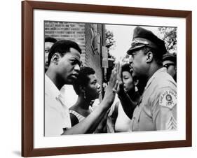 Chicago African American Policeman Tries to Calm a Crowd-null-Framed Photo