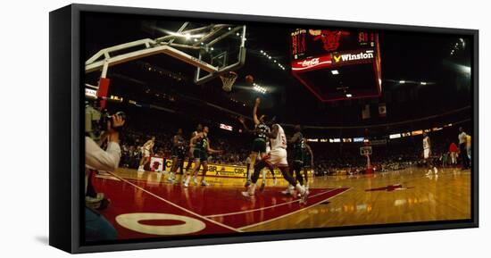 Chicago bulls player playing in a stadium, Chicago Stadium, Chicago, Cook County, Illinois, USA-null-Framed Stretched Canvas