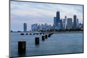 Chicago, Illinois, USA, Seagulls sit atop metal pylons in the waters of Lake Michigan.-Brent Bergherm-Mounted Photographic Print