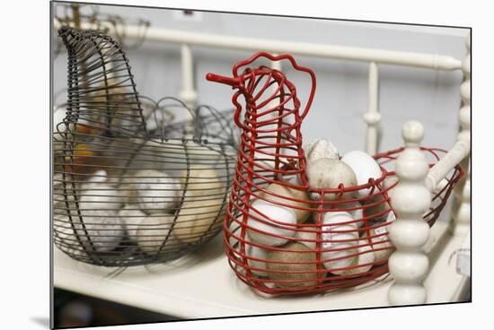 Chicken-shaped metal baskets holding rocks.-Julien McRoberts-Mounted Photographic Print