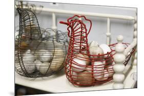 Chicken-shaped metal baskets holding rocks.-Julien McRoberts-Mounted Photographic Print