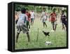 Chickens Run to Avoid a Soccer Game Played by Children from Lolovoli Village on the Island of Ambae-null-Framed Stretched Canvas