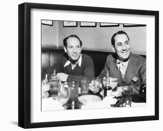 Chico (Left) and Groucho Marx at Lunch in the Famous Brown Derby Restaurant in Hollywood-null-Framed Premium Photographic Print