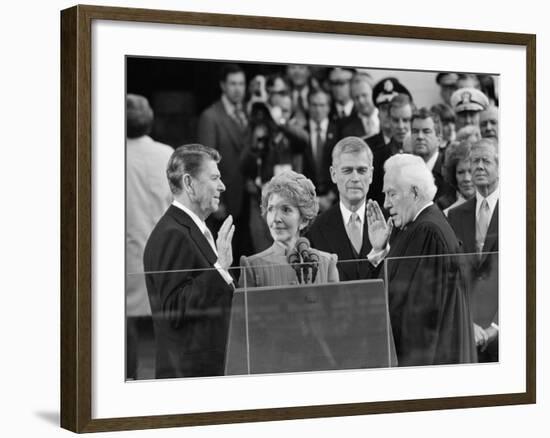 Chief Justice Warren Burger Administers the Oath of Office to Ronald Reagan, January 20, 1981-null-Framed Photographic Print