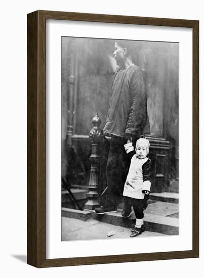 Child and Adult during New Year's in Chinatown NYC Photo - New York, NY-Lantern Press-Framed Art Print