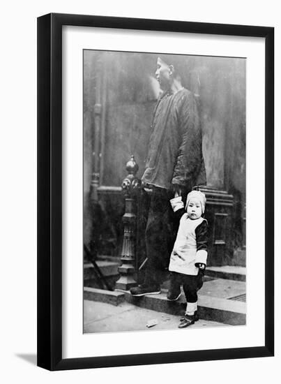 Child and Adult during New Year's in Chinatown NYC Photo - New York, NY-Lantern Press-Framed Art Print