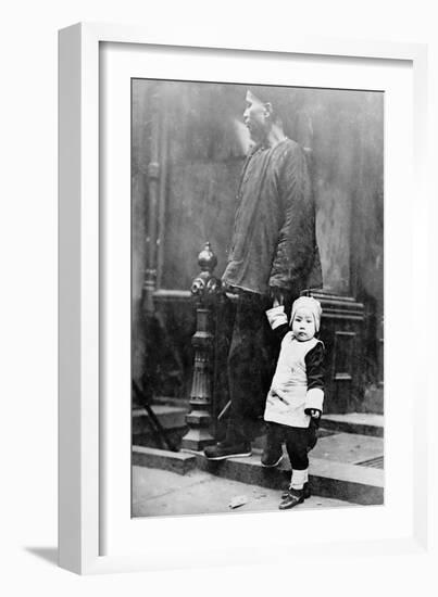 Child and Adult during New Year's in Chinatown NYC Photo - New York, NY-Lantern Press-Framed Art Print