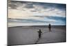 Child and Parent on Beach-Clive Nolan-Mounted Photographic Print