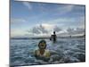 Child as She Plays in the Waves at a Beach in Port Blair, India-null-Mounted Photographic Print
