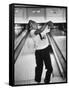 Child Bowling at a Local Bowling Alley-Art Rickerby-Framed Stretched Canvas