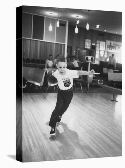 Child Bowling at a Local Bowling Alley-Art Rickerby-Stretched Canvas